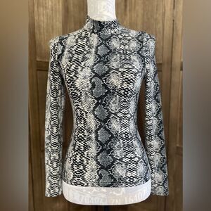 Snakeskin Mock Turtleneck Blouse.